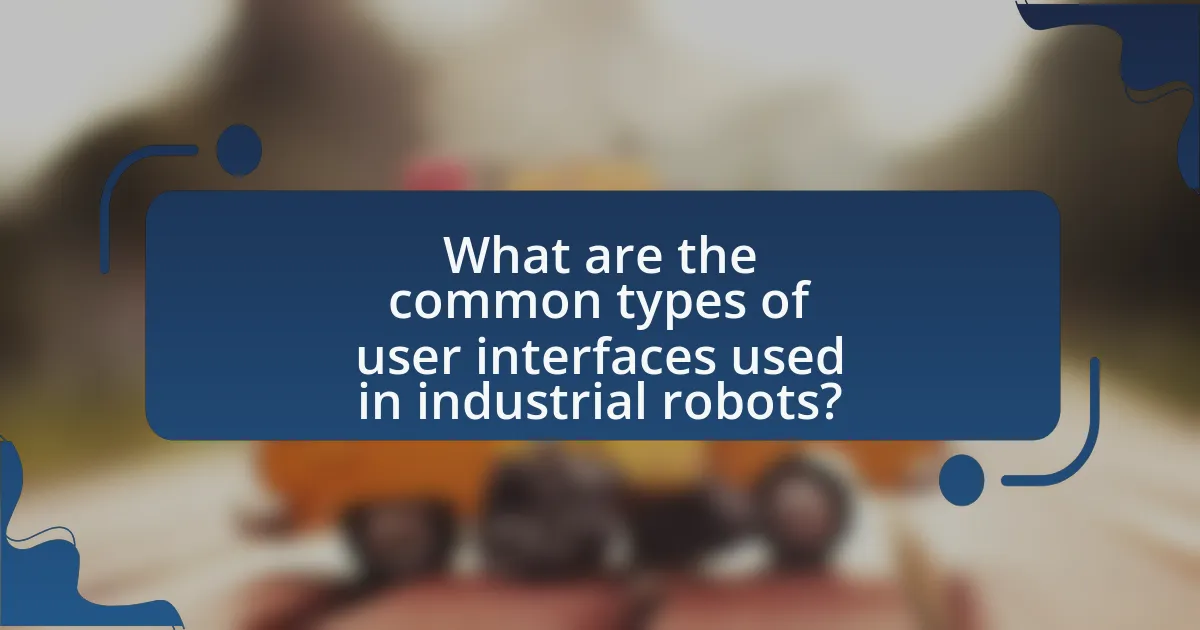 What are the common types of user interfaces used in industrial robots?